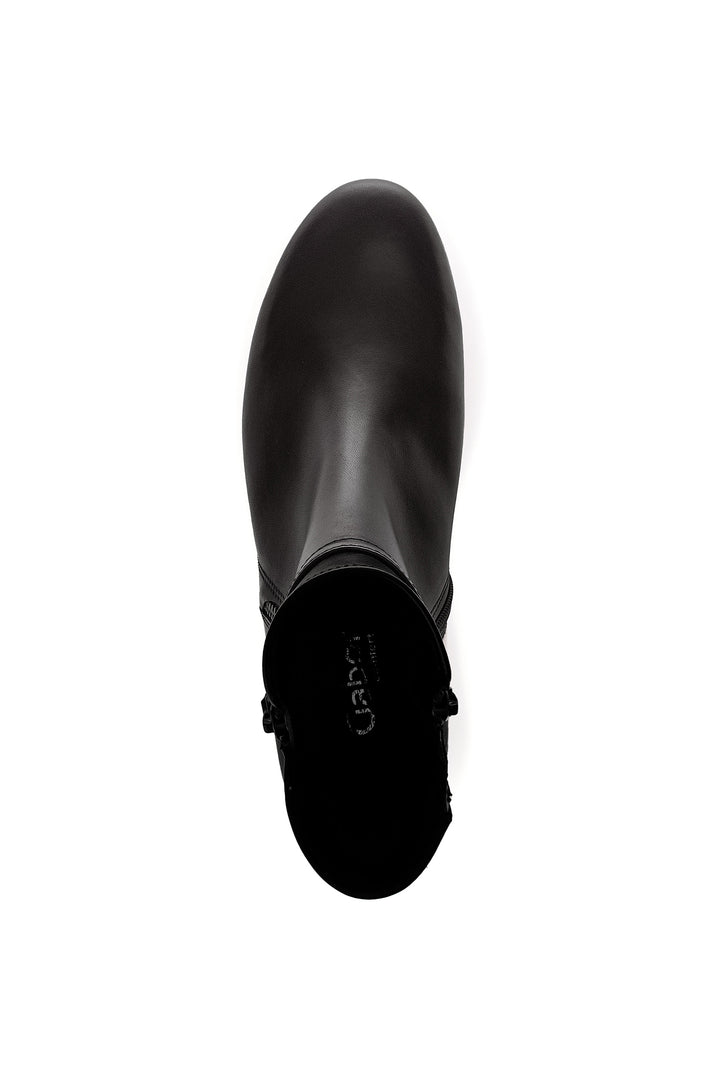 Black ankle boot on a white background