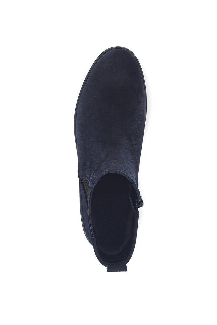 Navy blue ankle boot on a white background