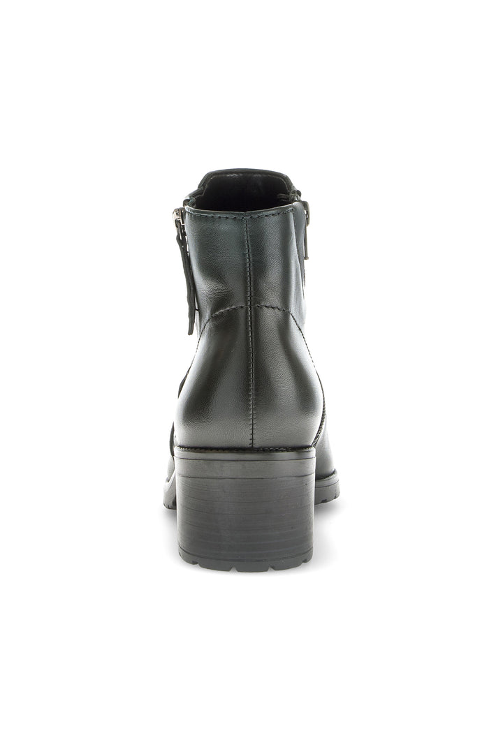 Black leather boot on a white background