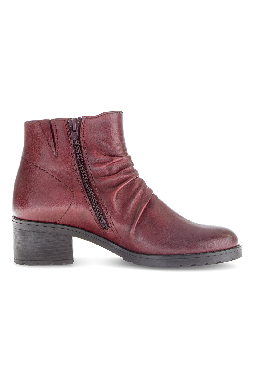Maroon ankle boot with a zipper on a white background