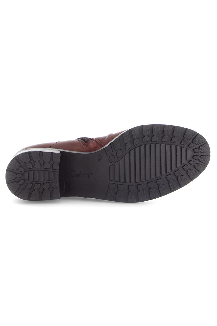 Brown shoe sole on a white background