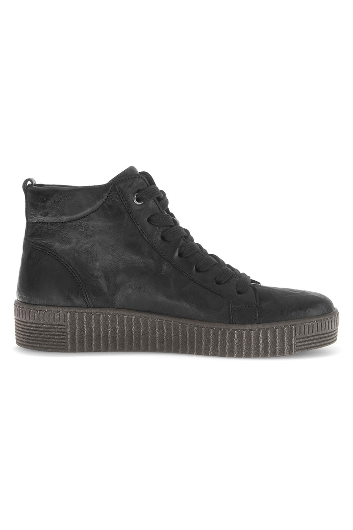 Black high-top sneaker on a white background