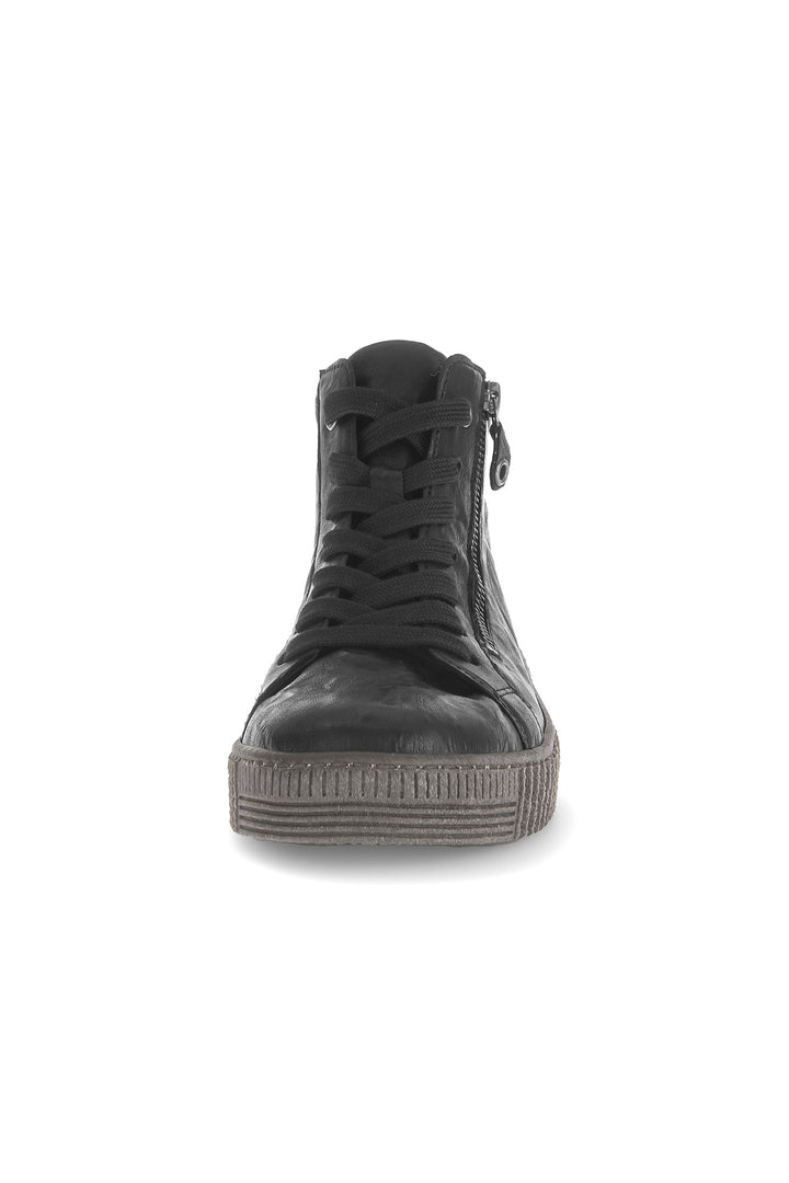 Black high-top sneaker on a white background