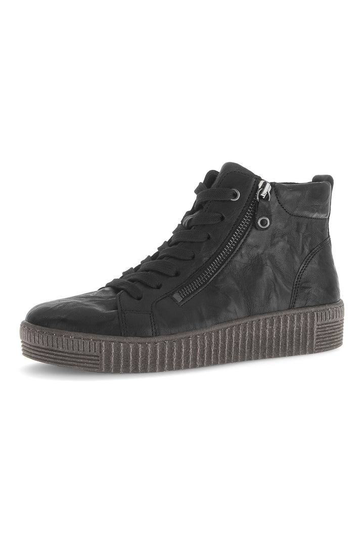Black high-top sneaker with a platform sole on a white background