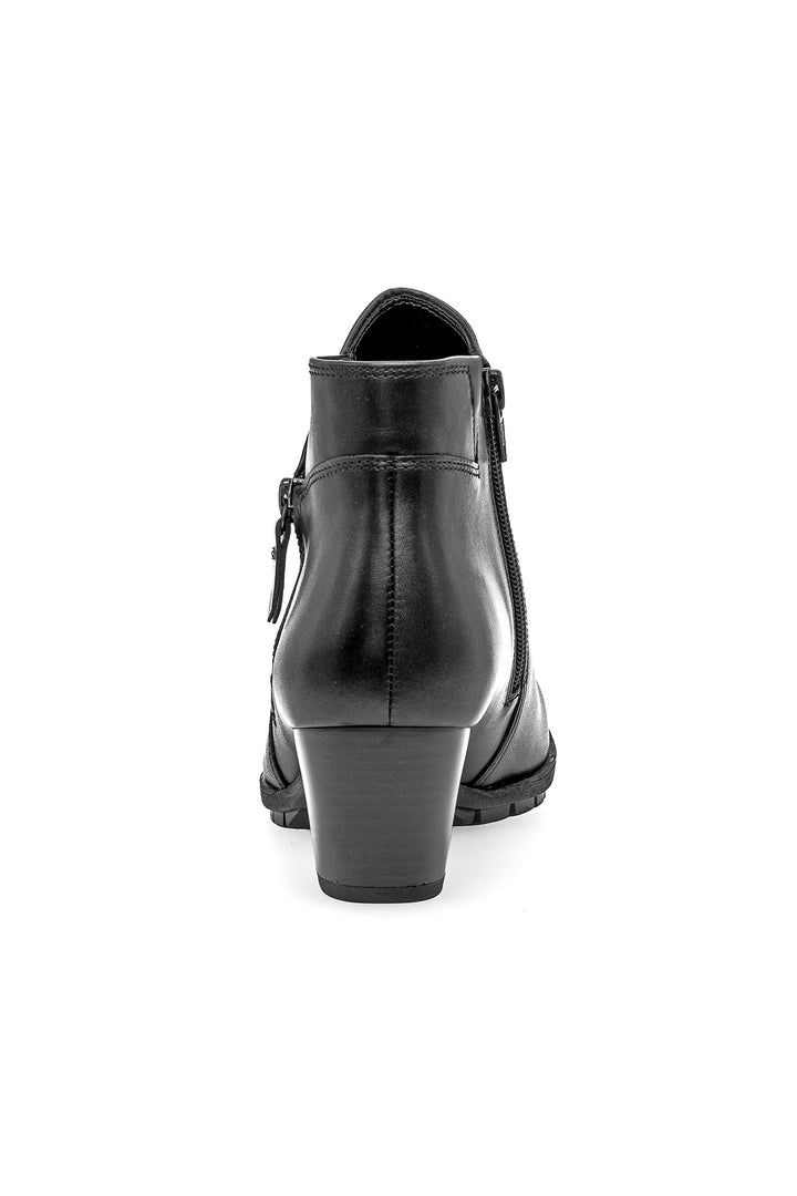 Black leather ankle boot on a white background