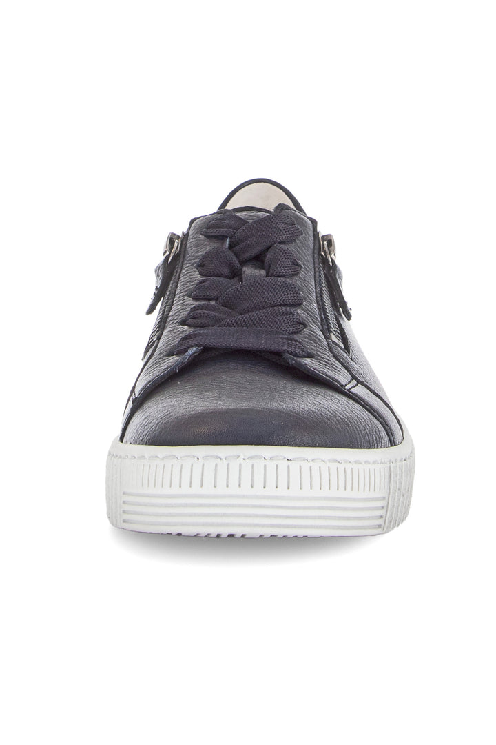 Gray sneaker with white sole on a white background