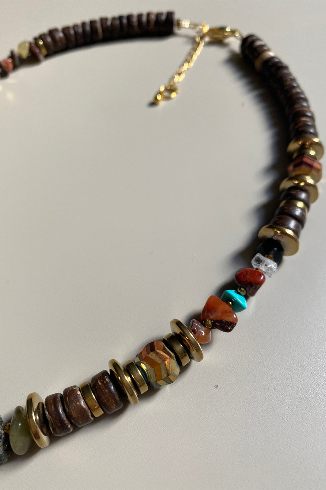 Gist Jewellery Brown Coconut and Gold Plated Hematite Necklace FRT08, close up of the coconut beads