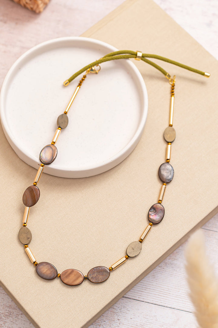 Gist Jewellery Brown Shell and Hematite Necklace BDL09, styled flat lay