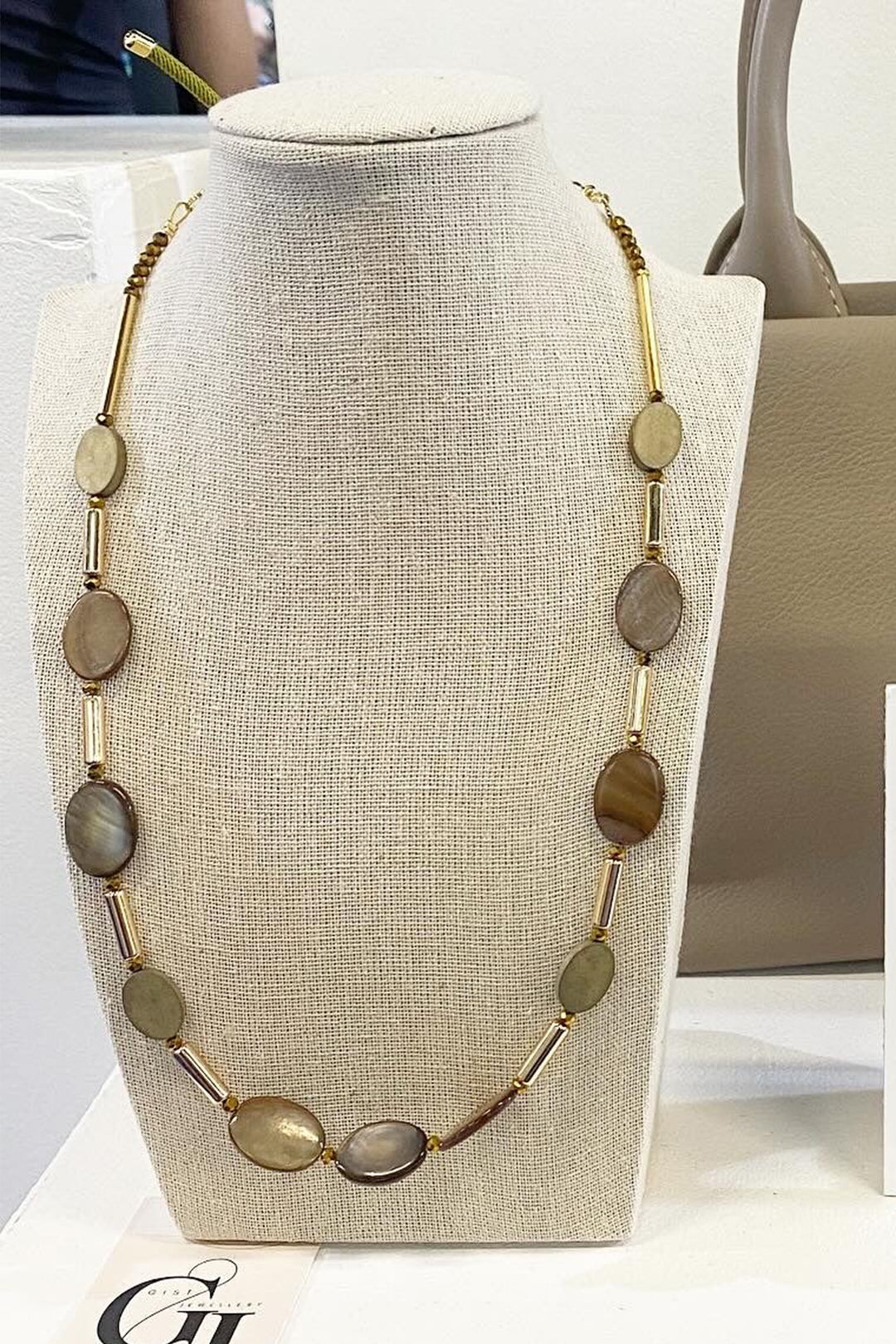 Gist Jewellery Brown Shell and Hematite Necklace BDL09, on a display bust
