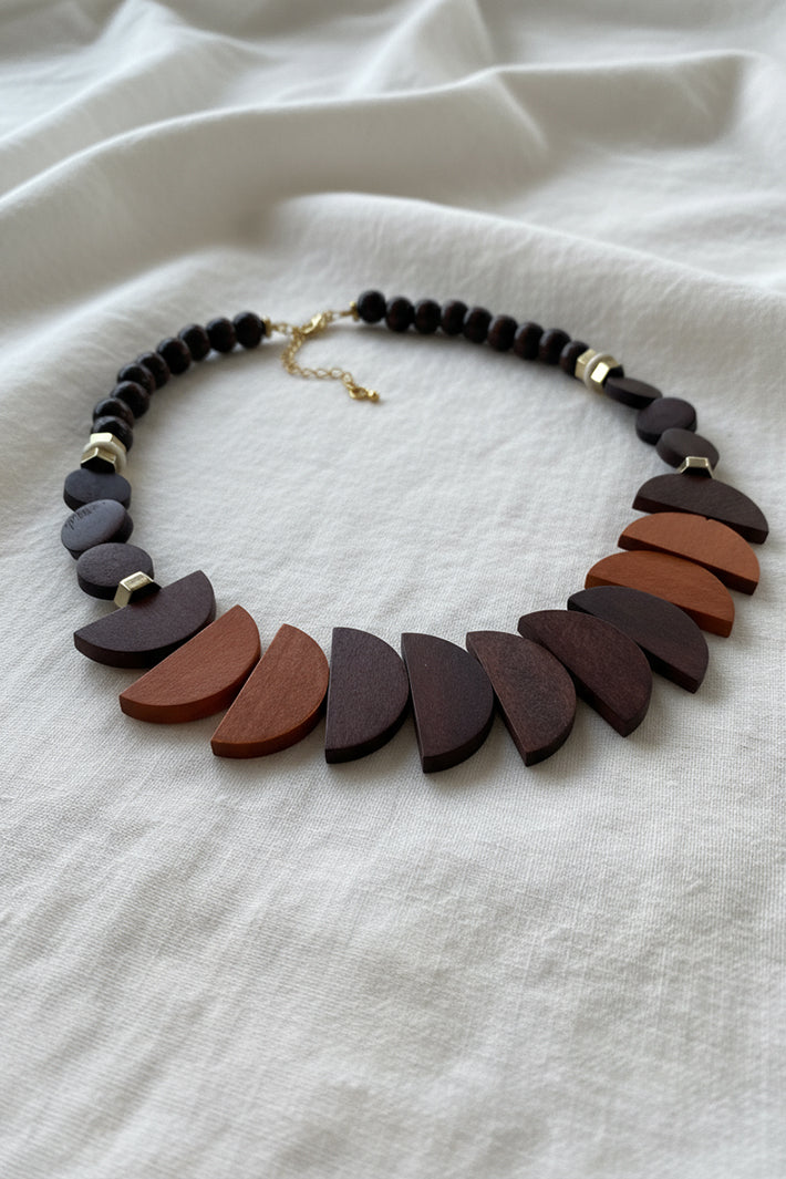 Gist Jewellery Chocolate Orange Brown Wooden Necklace BDL07, styled on linen