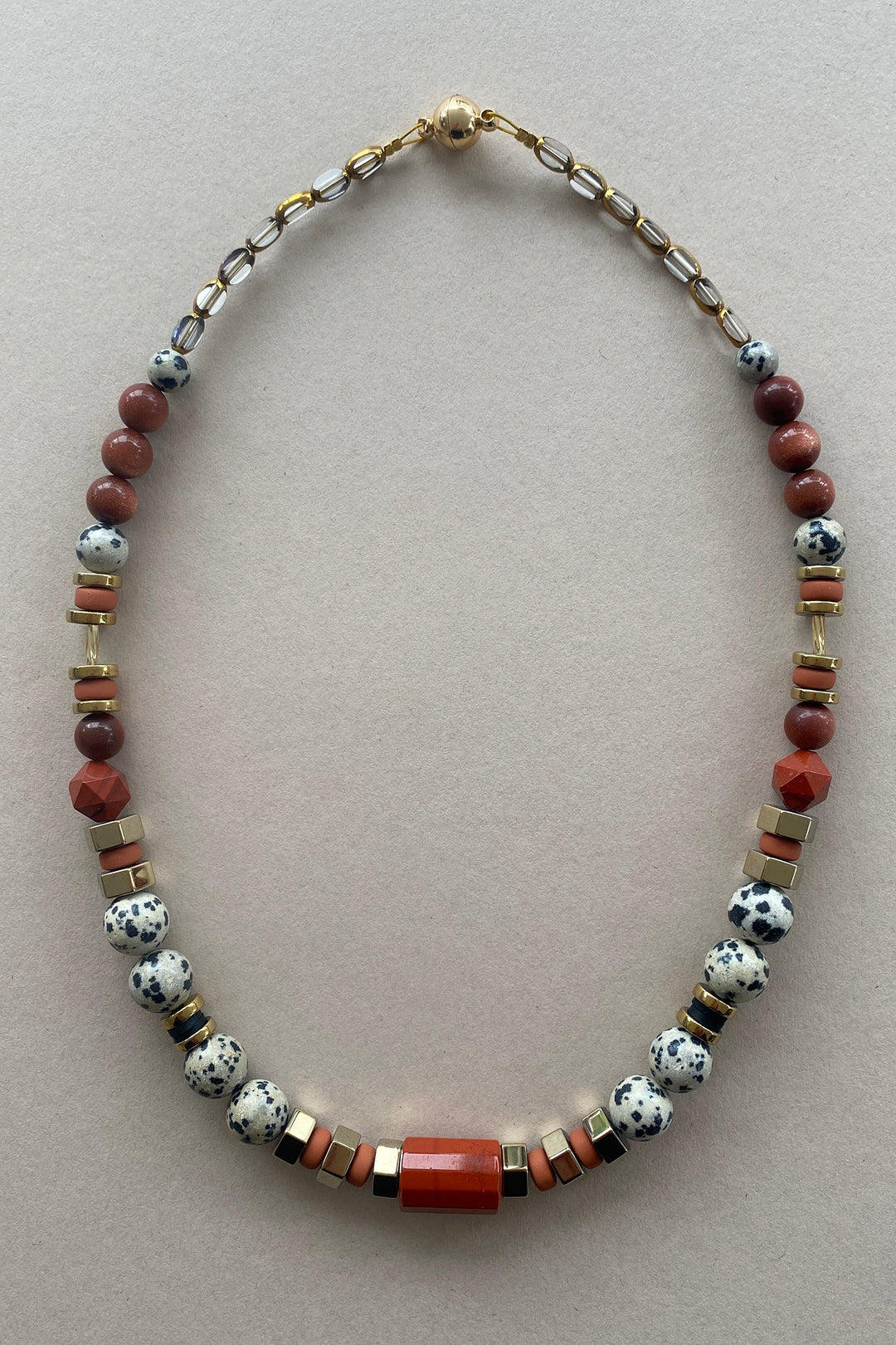 Gist Jewellery Red and Cream Dalmatian Jasper and Sandstone Barrel Necklace BDL02, laid flat, overhead