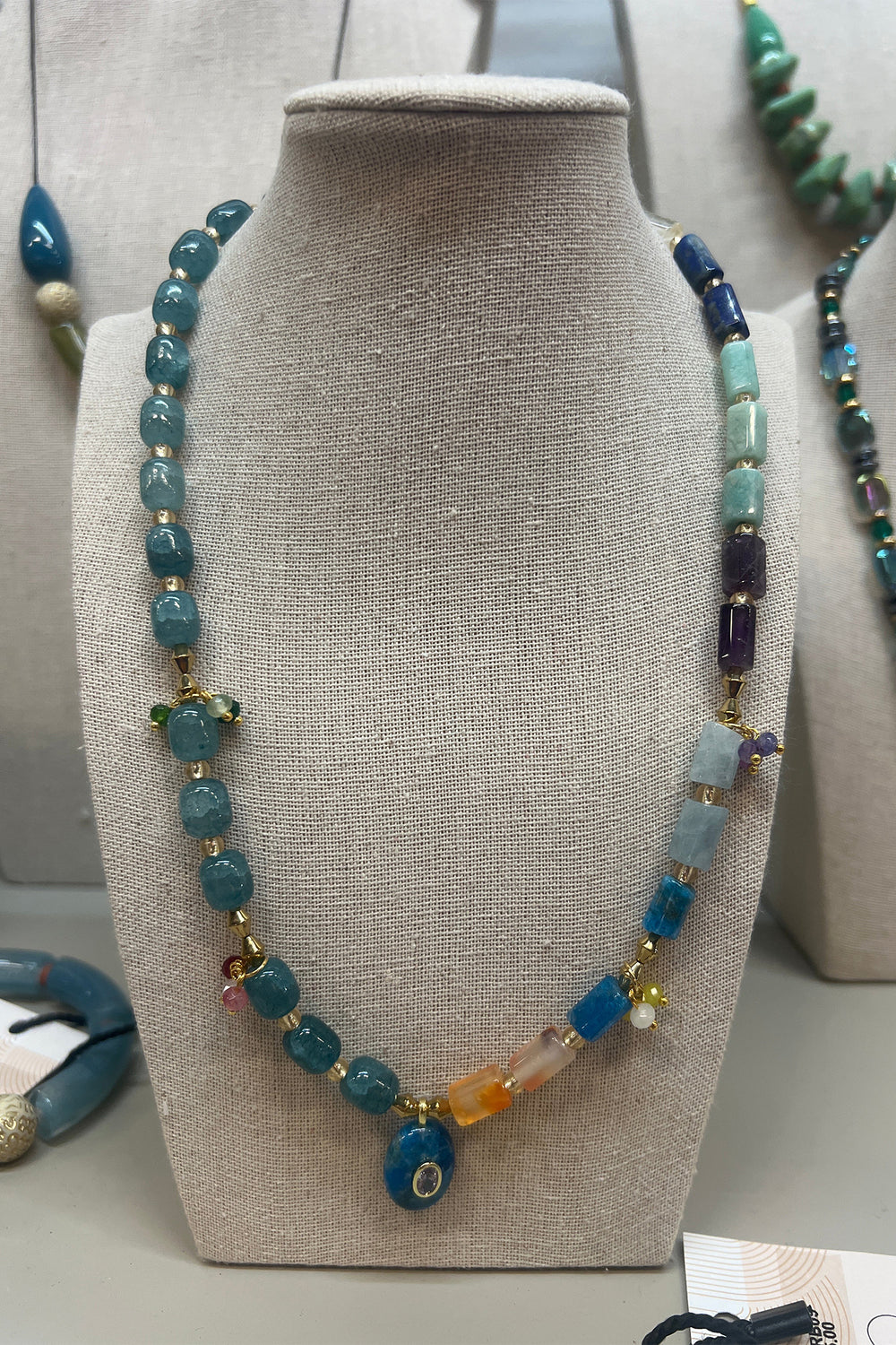 Gist Jewellery Turquoise and Multicoloured Necklace EOR09, on a display bust