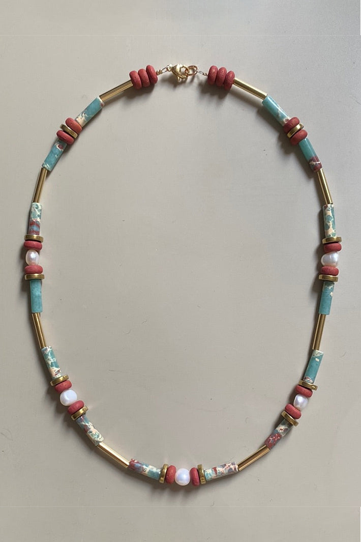Gist Jewellery Turquoise and Terracotta Freshwater Pearl and Gold Plated Necklace MRL08, laid flat