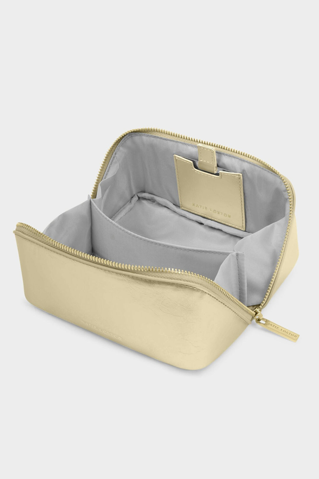 Beige cosmetic bag with gray interior on a white background