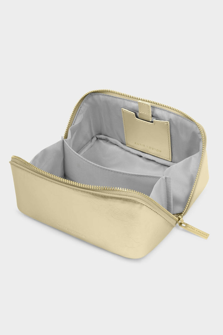 Beige cosmetic bag with gray interior on a white background