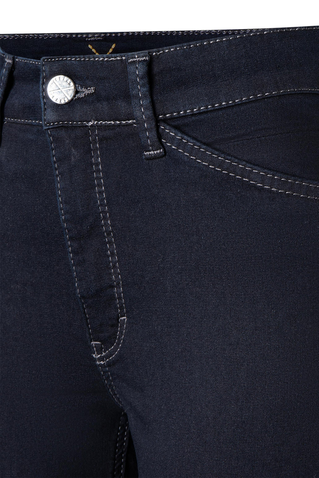 Close-up of dark blue jeans with a button and stitching detail.