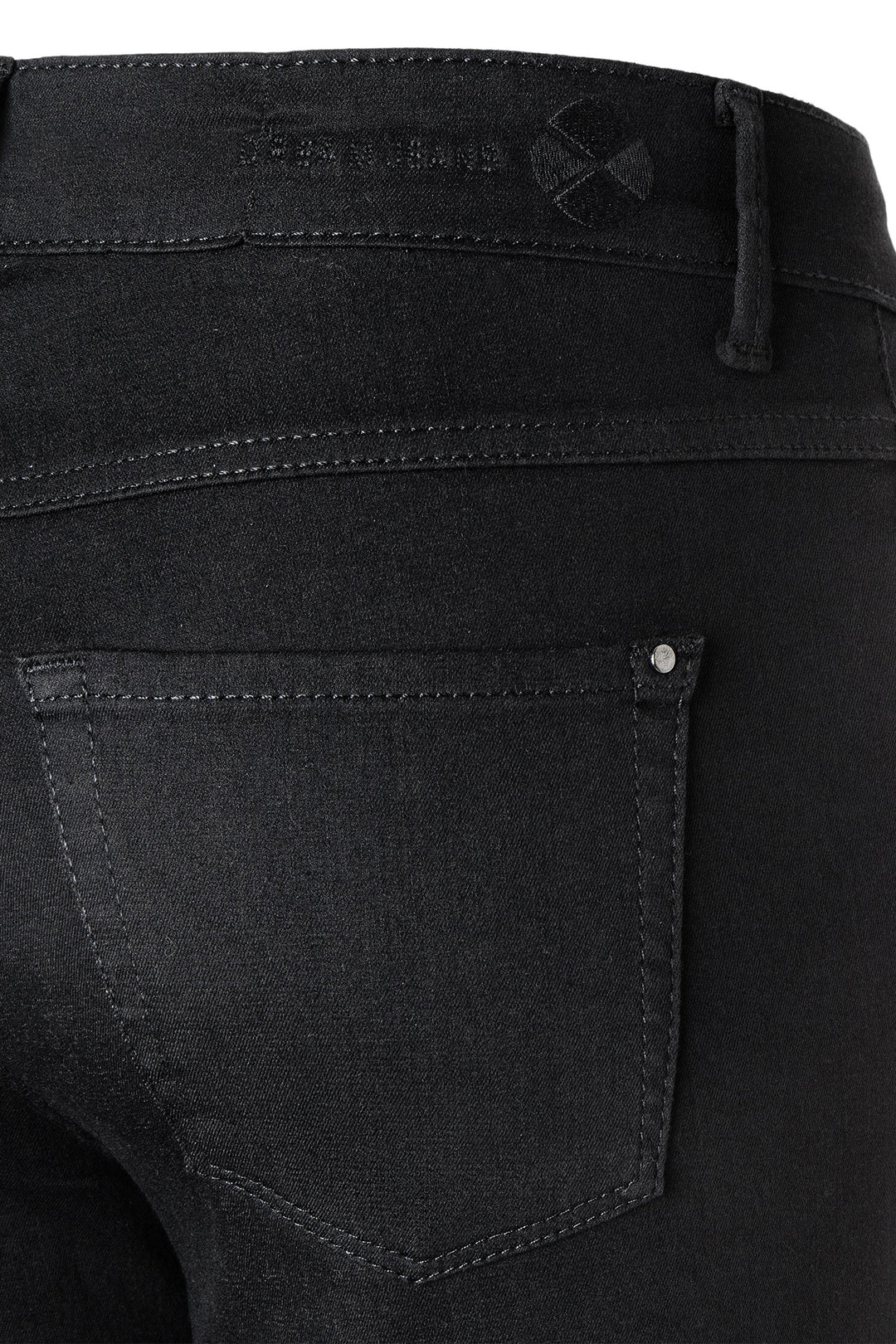 Black jeans with a brand logo on the back pocket.