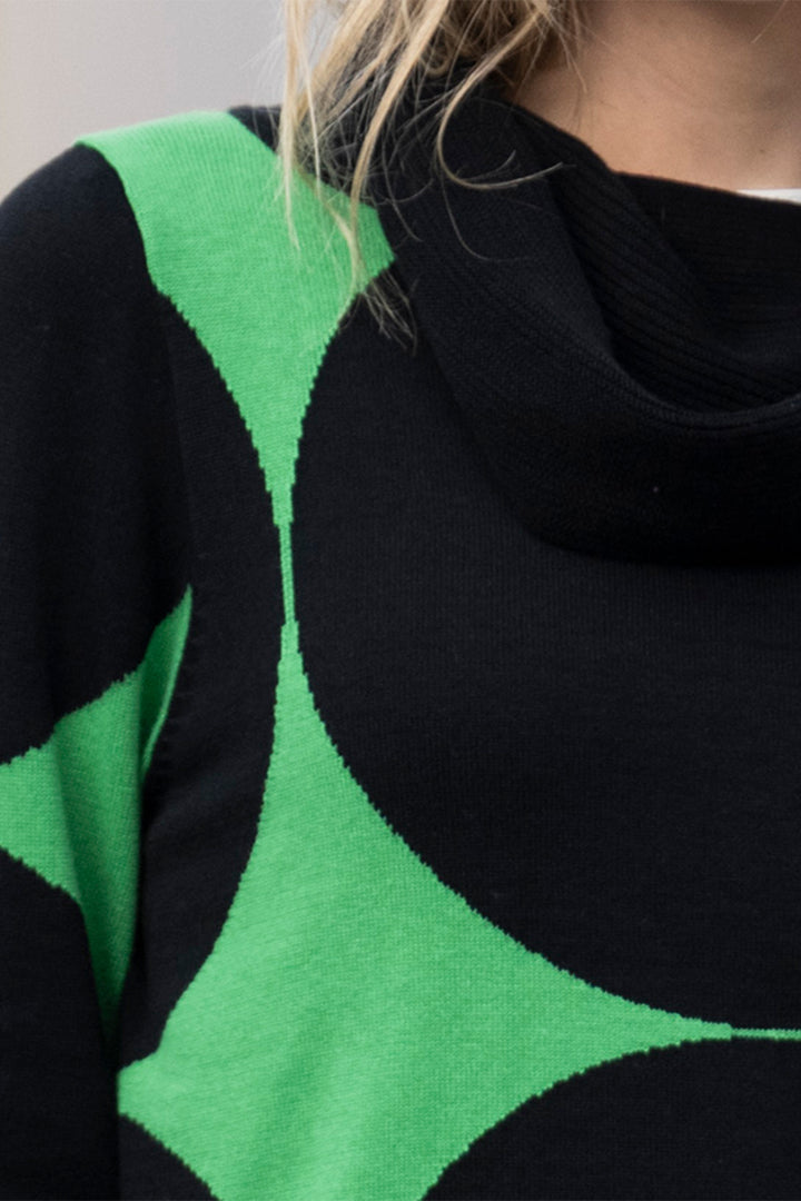 Close-up of a black and green patterned garment