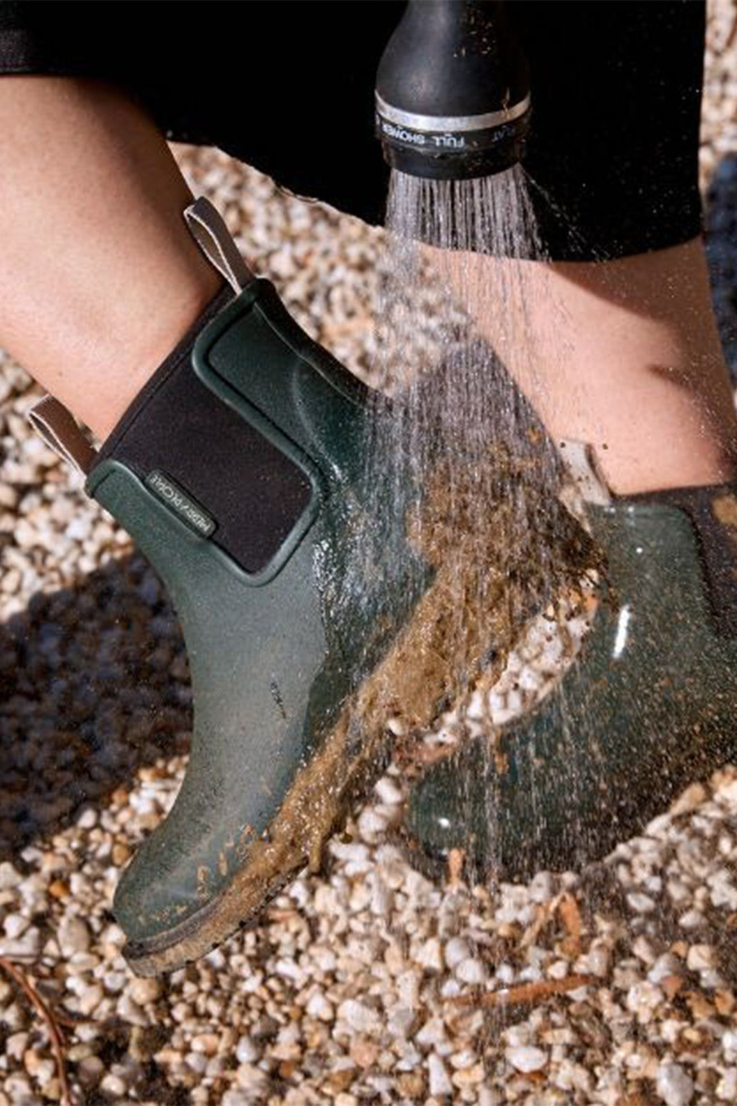 Merry People Bobbi Forest Green Short Wellington Boots, lifestyle, being hosed down