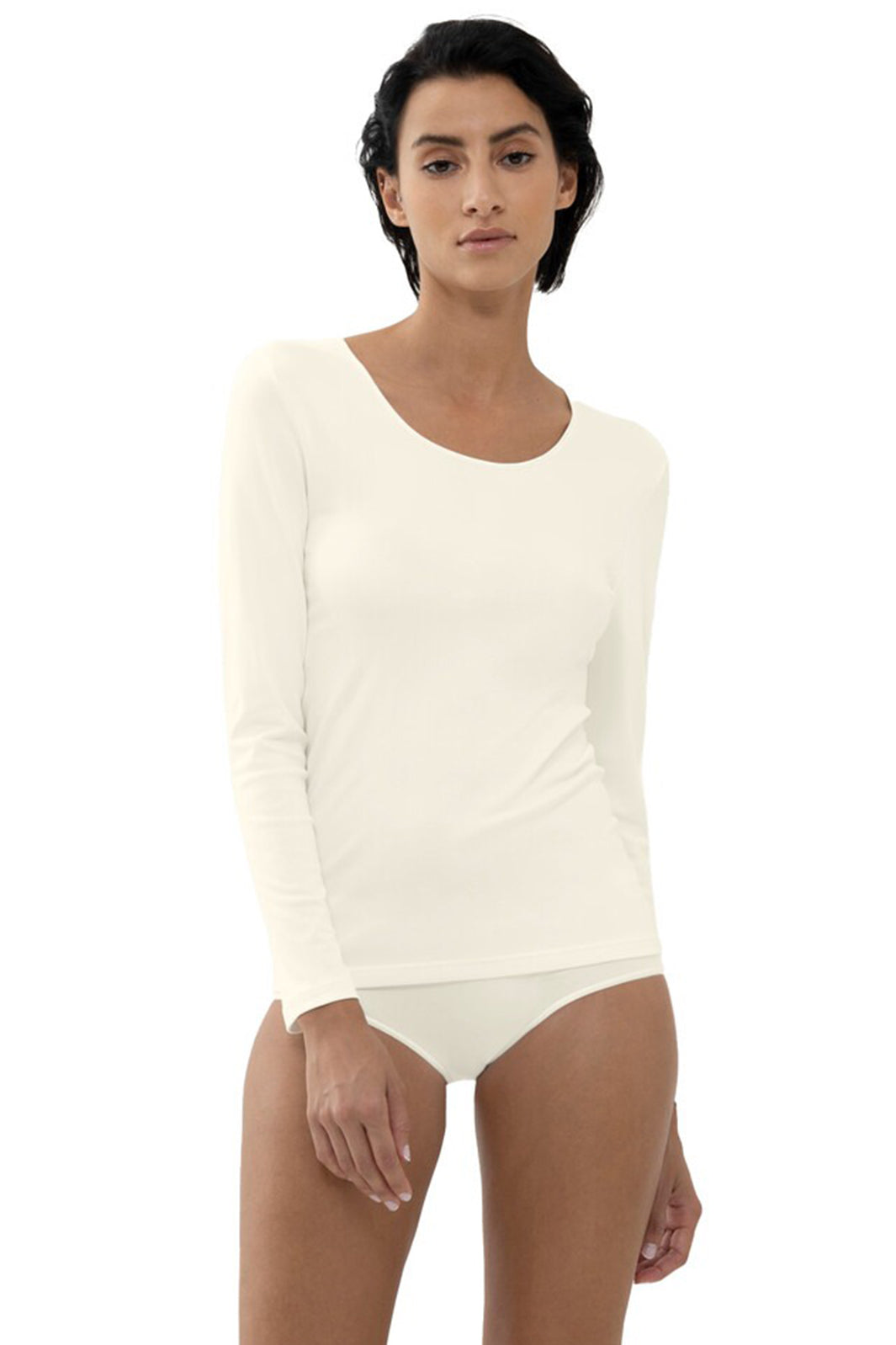 Woman wearing a white sleeveless top and underwear set on a white background