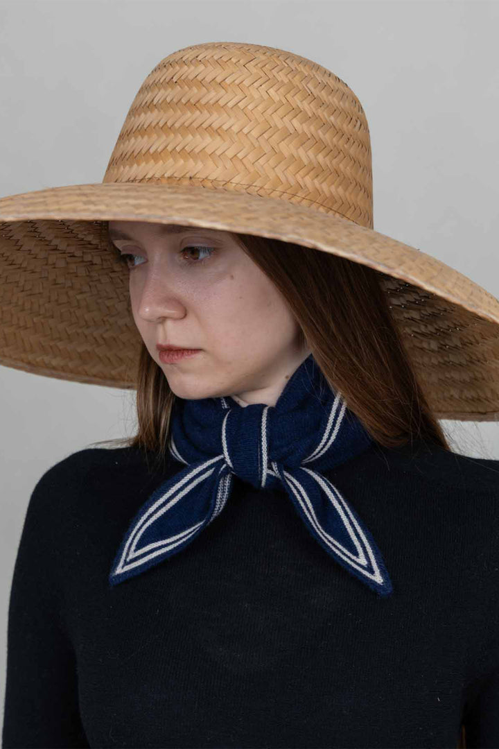 Oats &amp; Rice Bronte Navy Cashmere Scarf OR25-NS01, styled with a straw hat