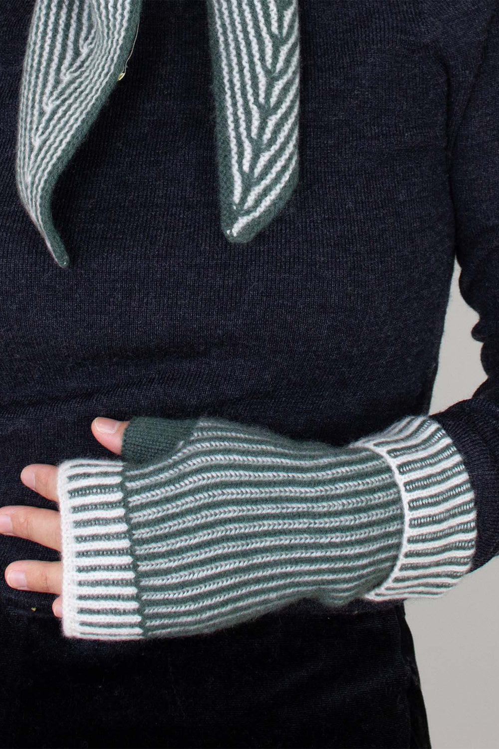 Oats & Rice Marine Green Cashmere Hand Warmer Gloves OR25-G03, worn with a matching scarf