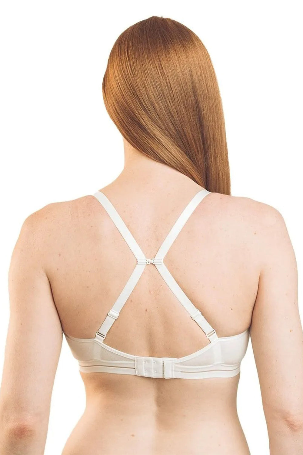 Woman wearing a beige bra with a white background