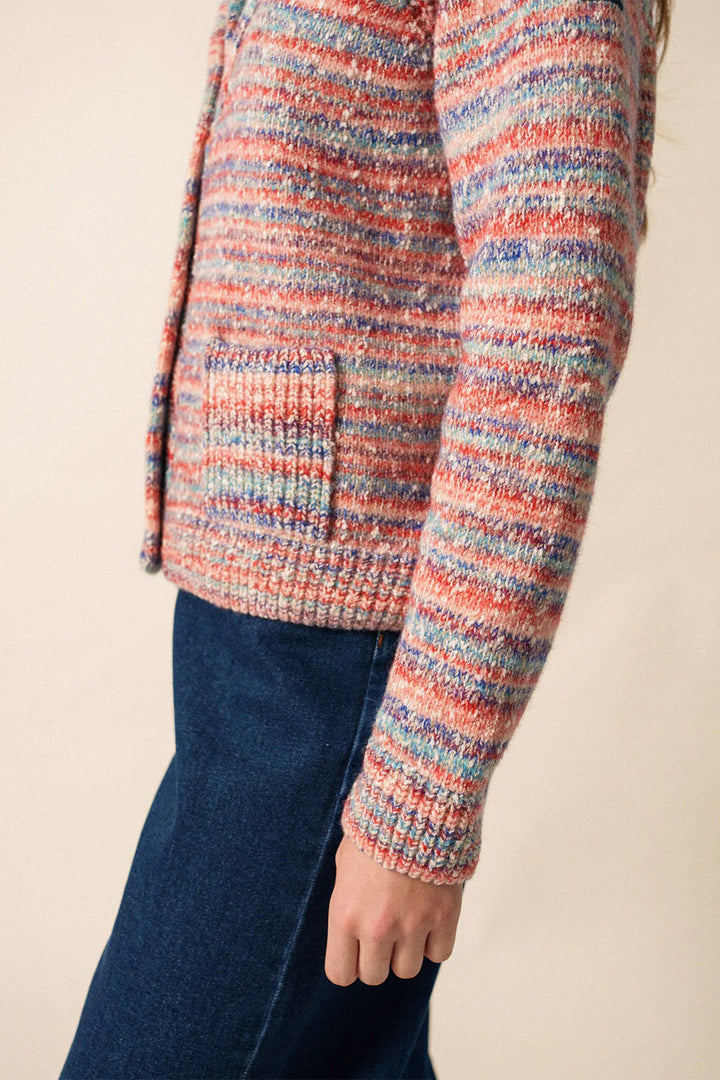 Multicolored knit sweater with a neutral background