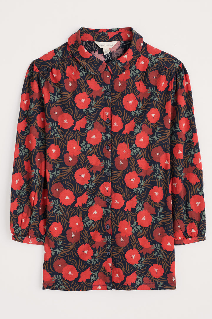 Floral patterned shirt with red flowers on a black background
