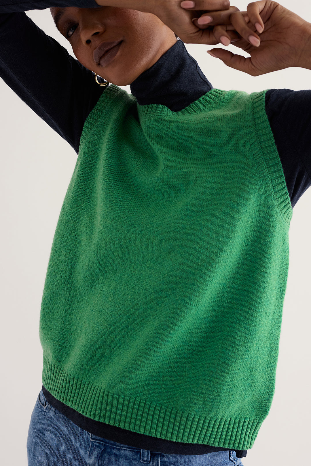 Seasalt Cornwall East View Pea Pod Green Merino Vest WM41086 38442, styled with denim