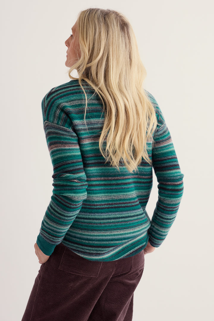 Seasalt Cornwall Fruity II Ripple Marks Dune Grass Mix Green Jumper, back view on model