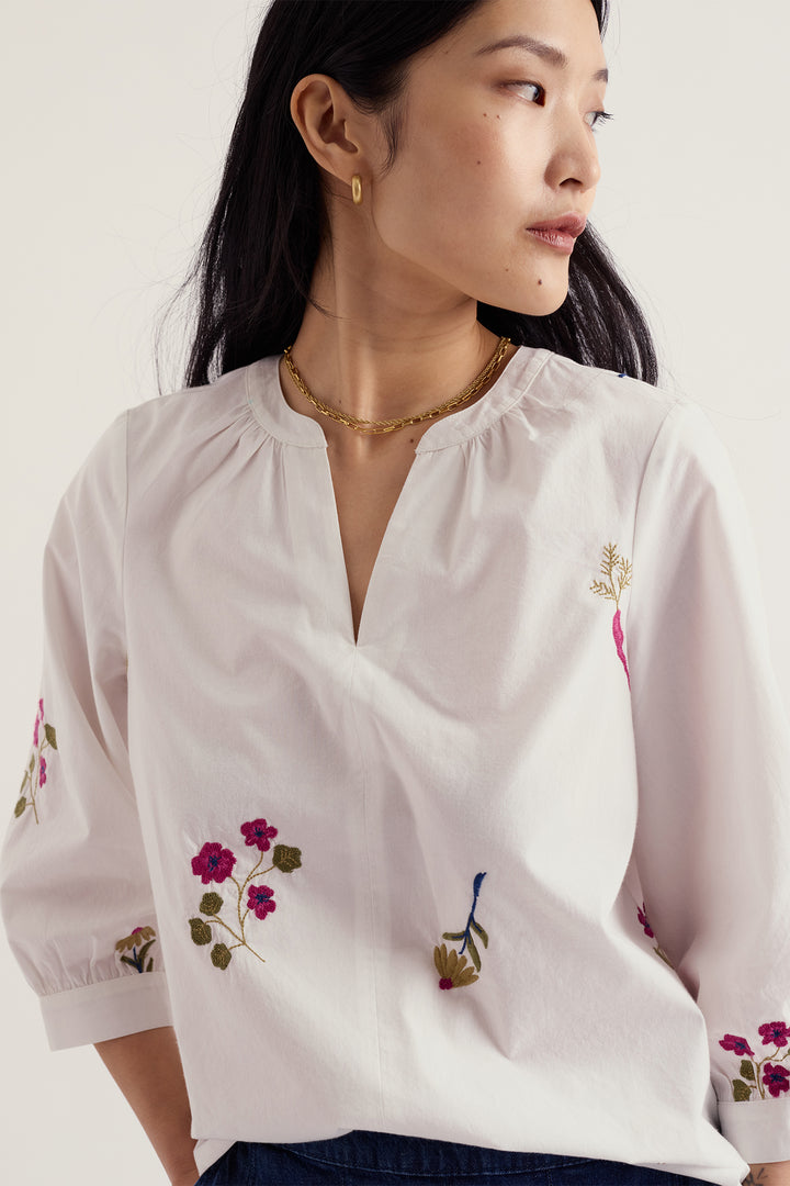 Seasalt Cornwall Grace Embroidered Flora Embroidery Chalk White Top WM40284 38467, front view on model showing the notch neckline