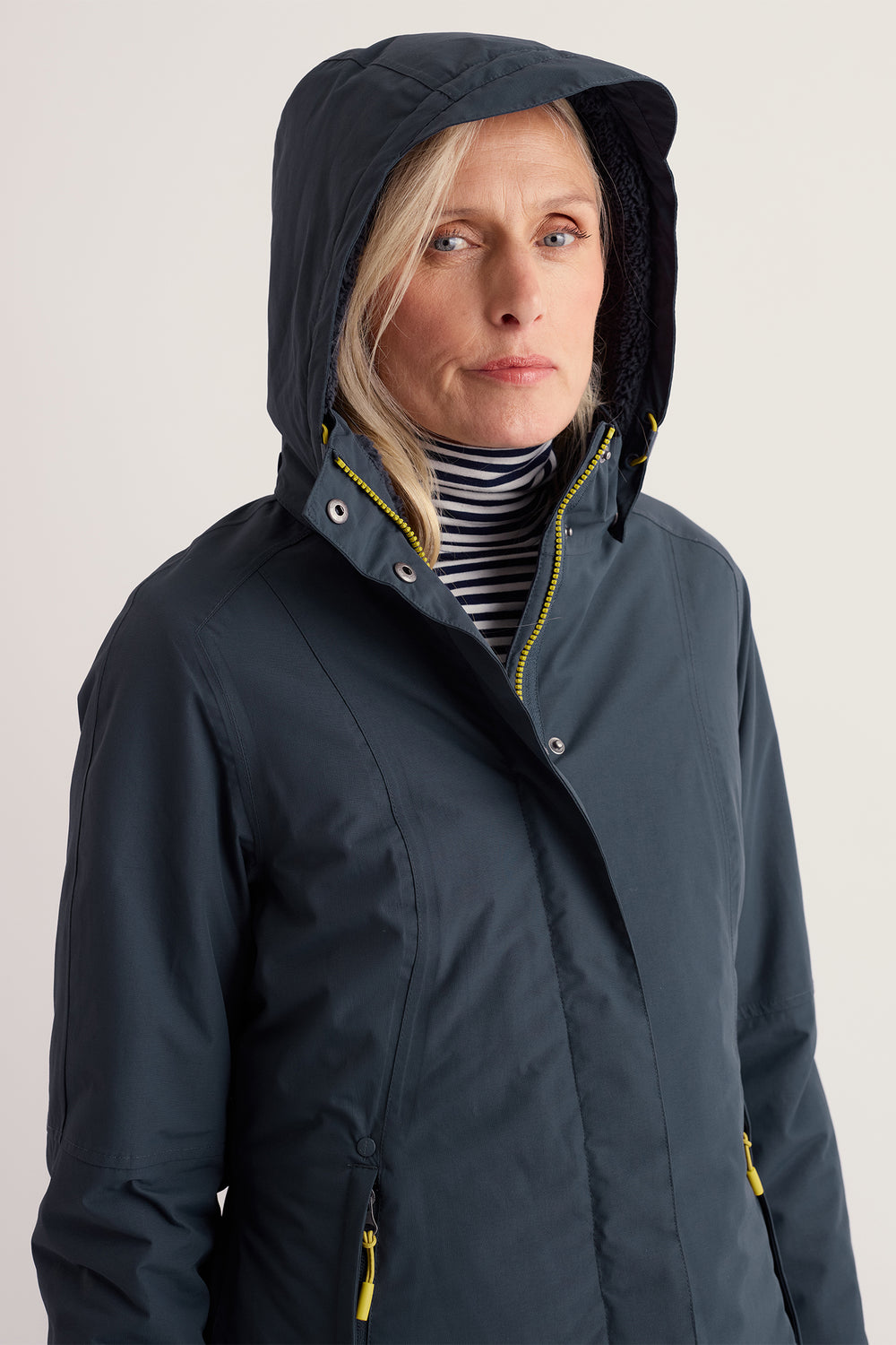 Seasalt Cornwall Janelle Squid Ink Navy Coat, hood up on model