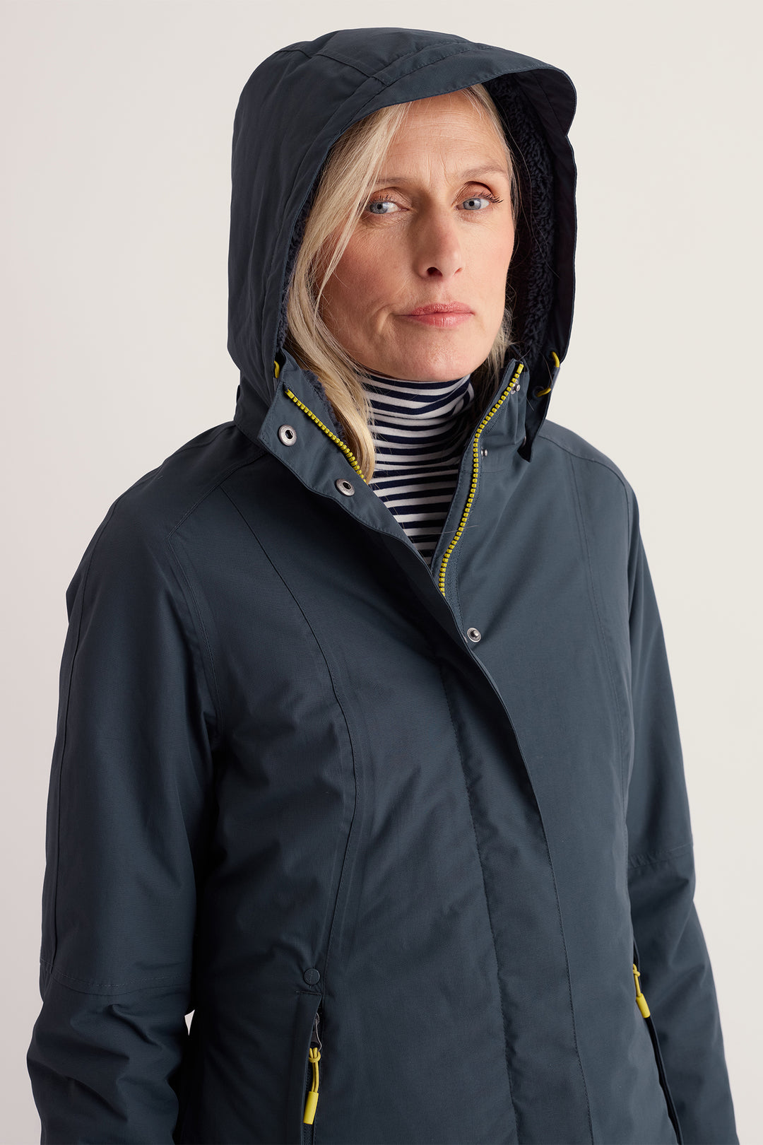 Seasalt Cornwall Janelle Squid Ink Navy Coat, hood up on model