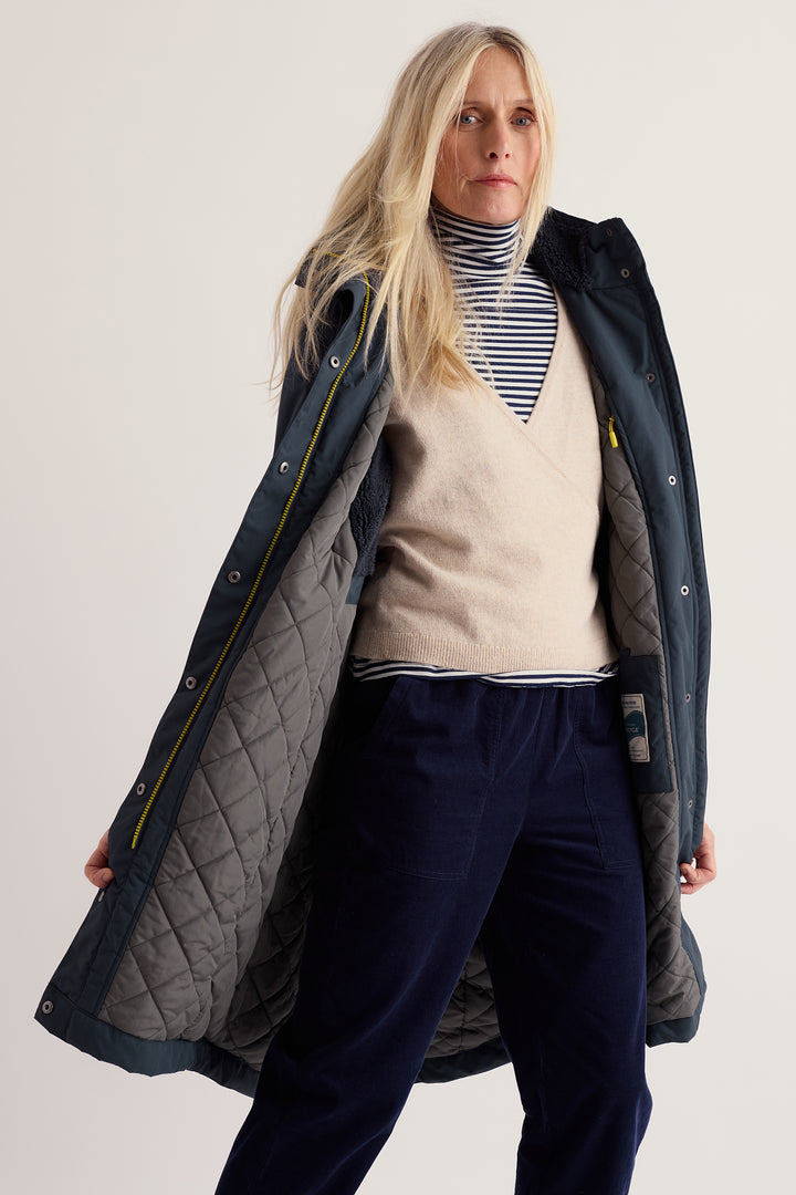 Seasalt Cornwall Janelle Squid Ink Navy Coat, worn open showing quilted lining