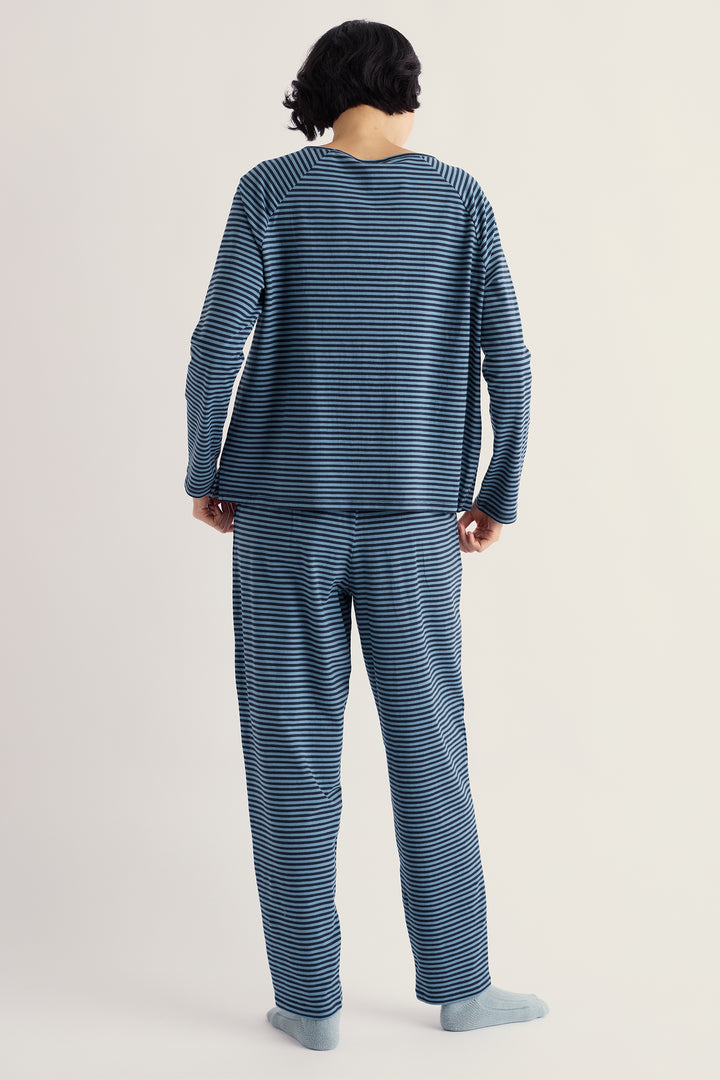 Seasalt Cornwall Setting Sun Obliques Maritime Cadet Navy Pyjamas, back view on model