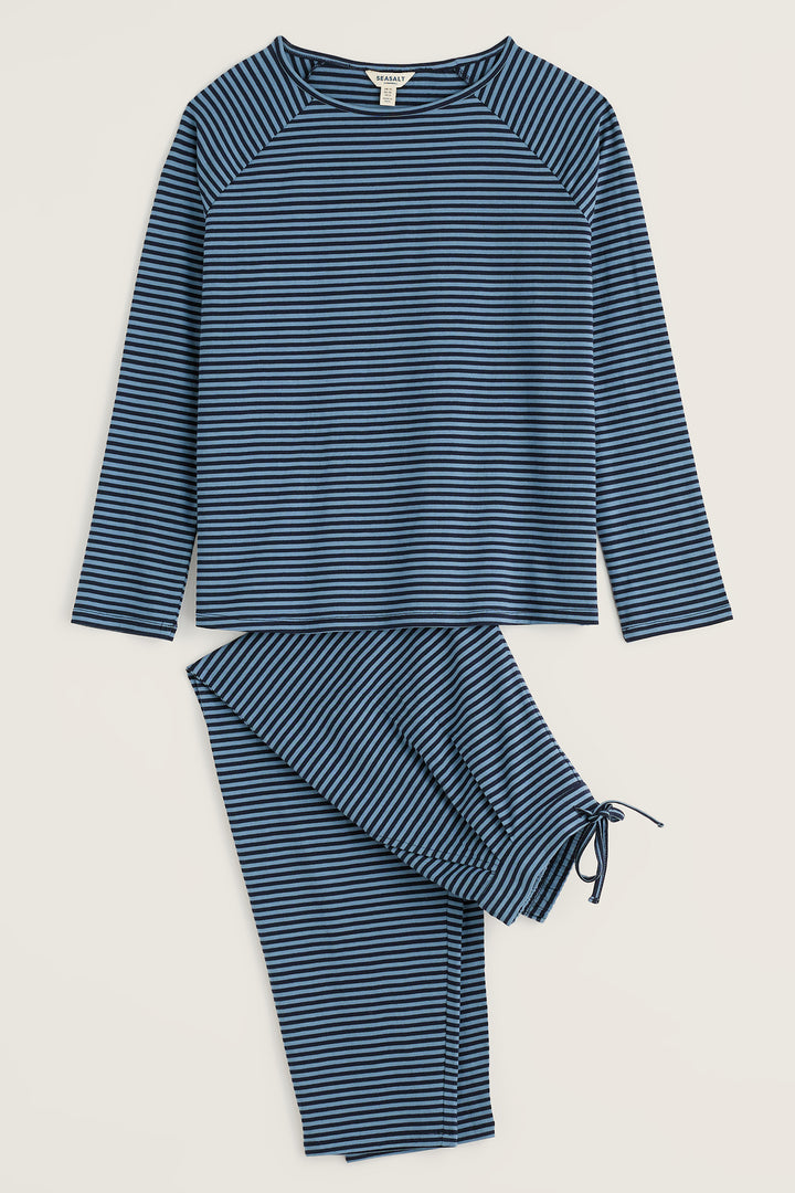 Seasalt Cornwall Setting Sun Obliques Maritime Cadet Navy Pyjamas, top and trousers shown flat