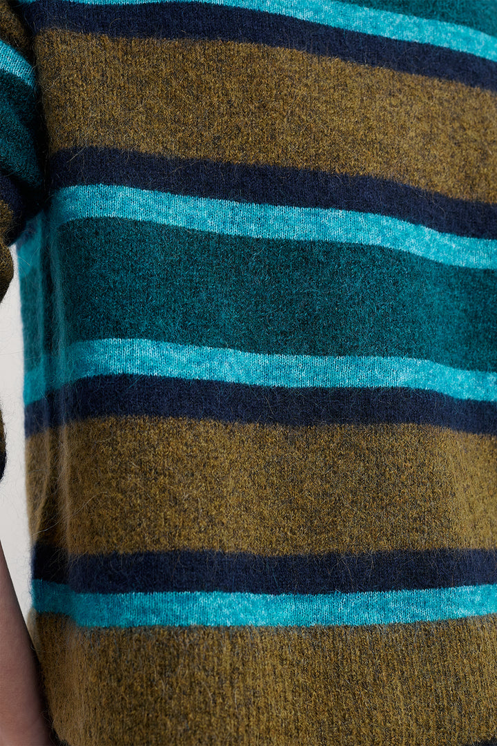 Close-up of a fabric with horizontal stripes in green, blue, and black.