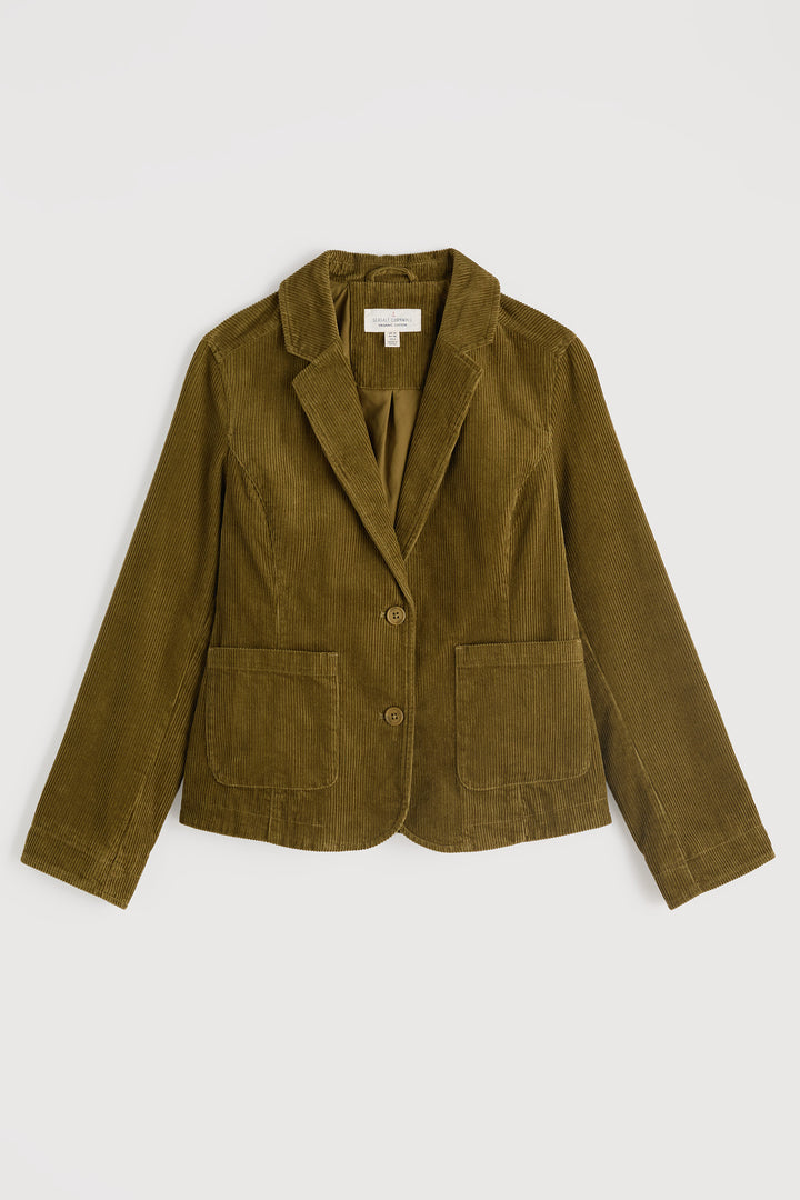 Green blazer on a light gray background