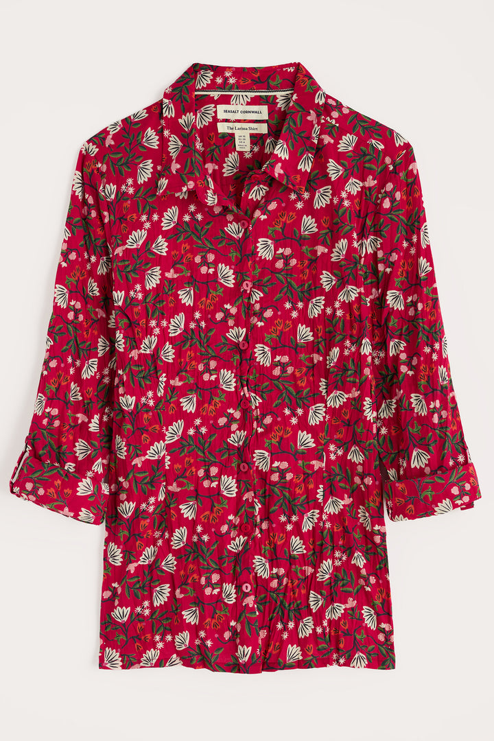 Red floral patterned dress on a white background