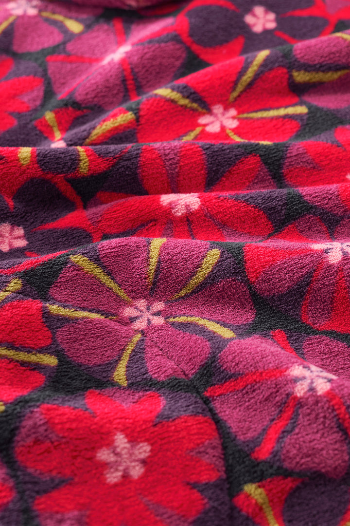 Close-up of a red and black floral patterned fabric