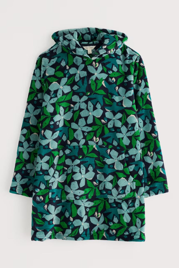 Green floral patterned raincoat on a white background