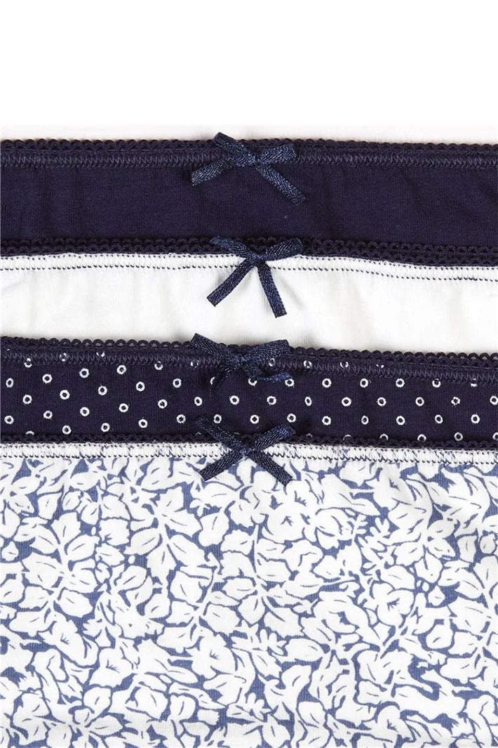 Set of three pairs of underwear with different patterns on a white background