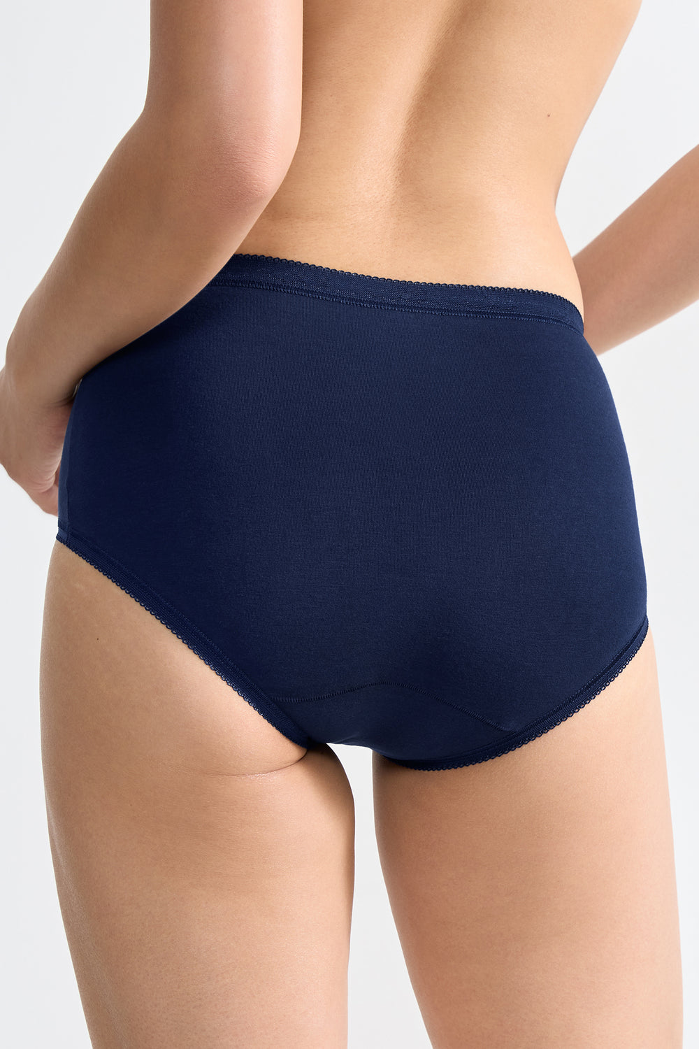Navy blue underwear on a plain background