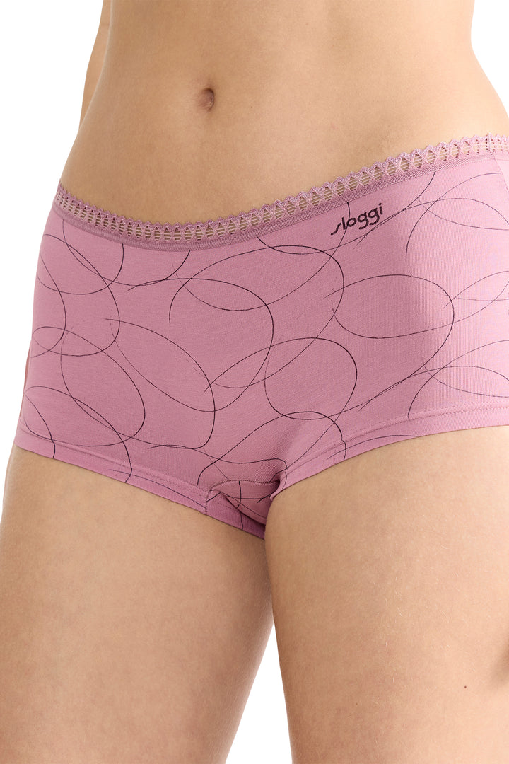 Pink underwear with a subtle pattern on a white background