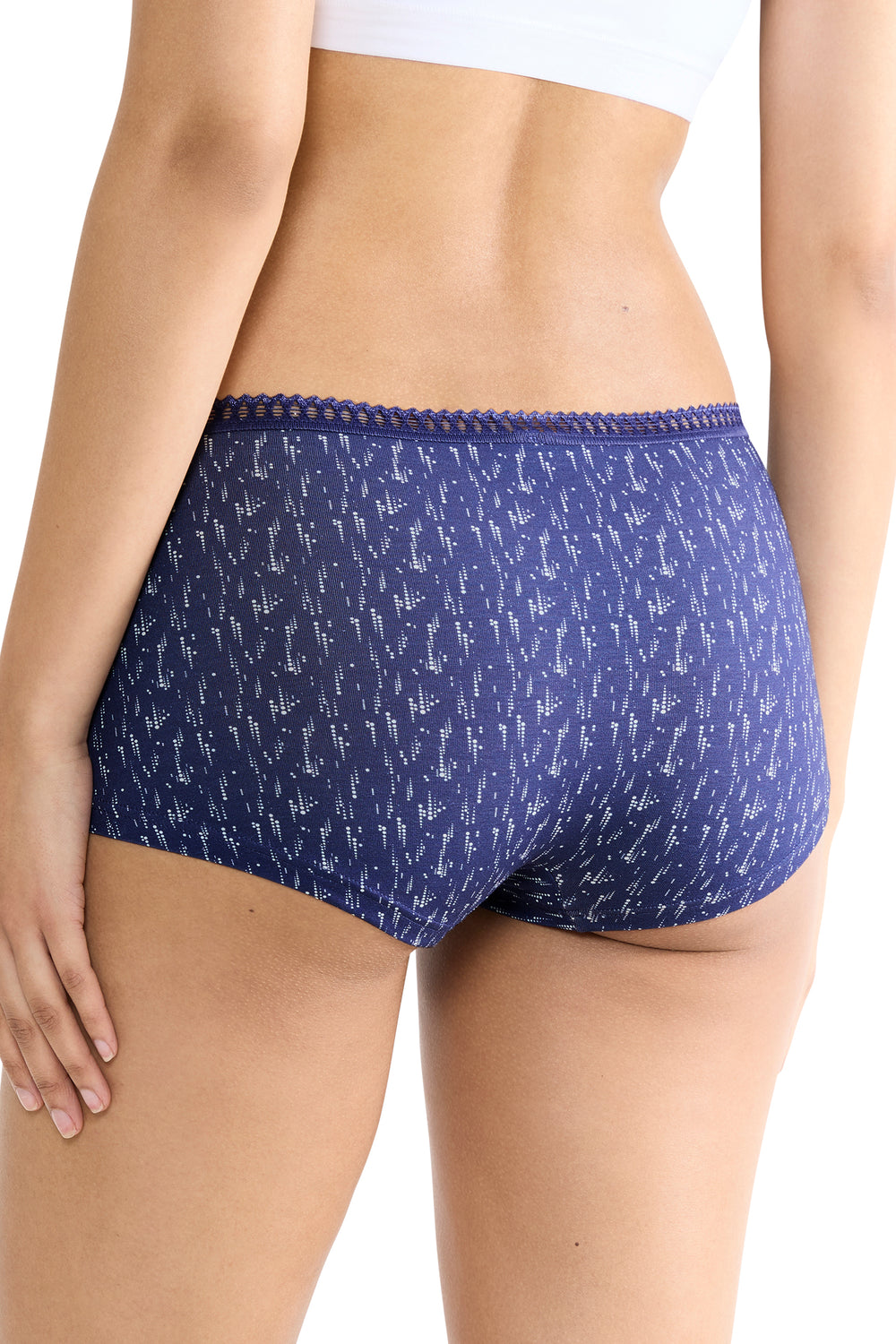 Blue patterned underwear worn by a person on a white background