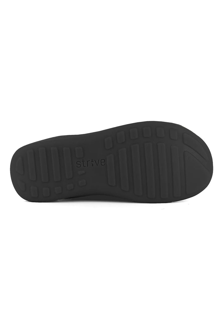 Black sole of a shoe with 'Strive' branding on a white background