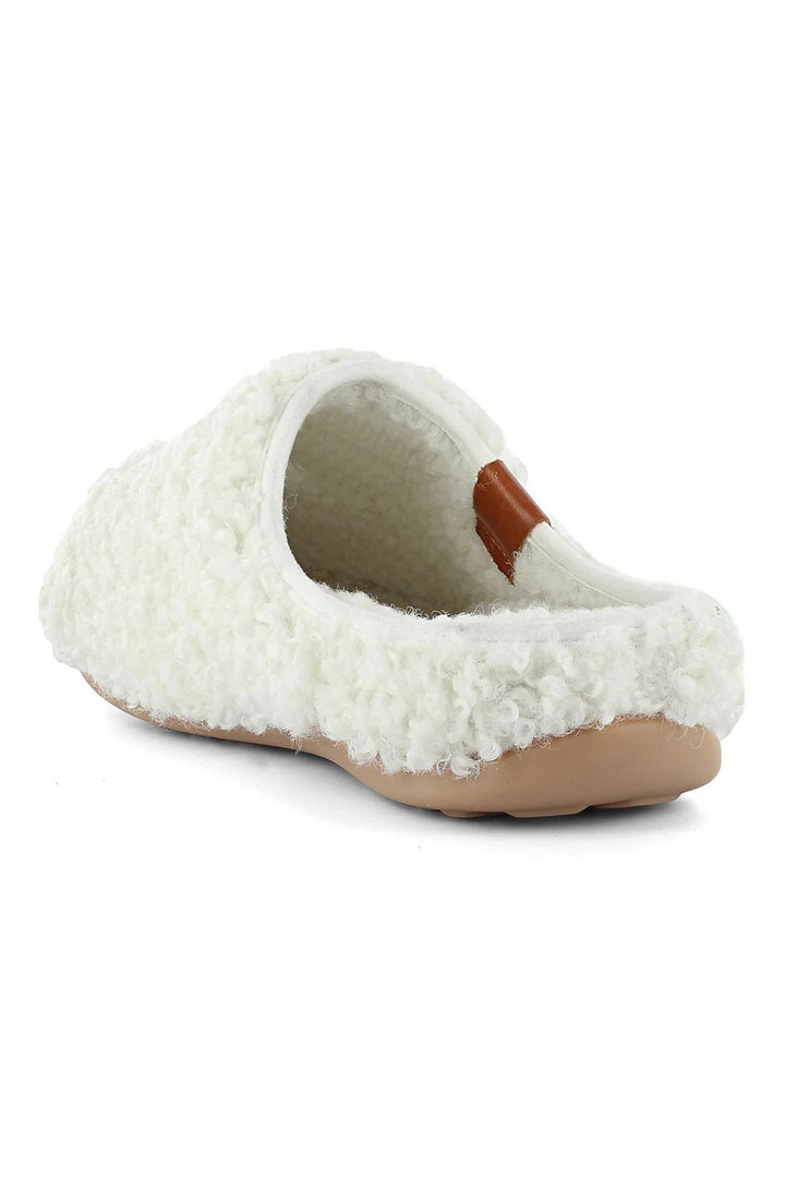 White fuzzy slippers with a brown sole on a white background