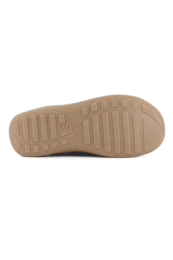 Tan shoe sole with 'Strive' branding on a white background