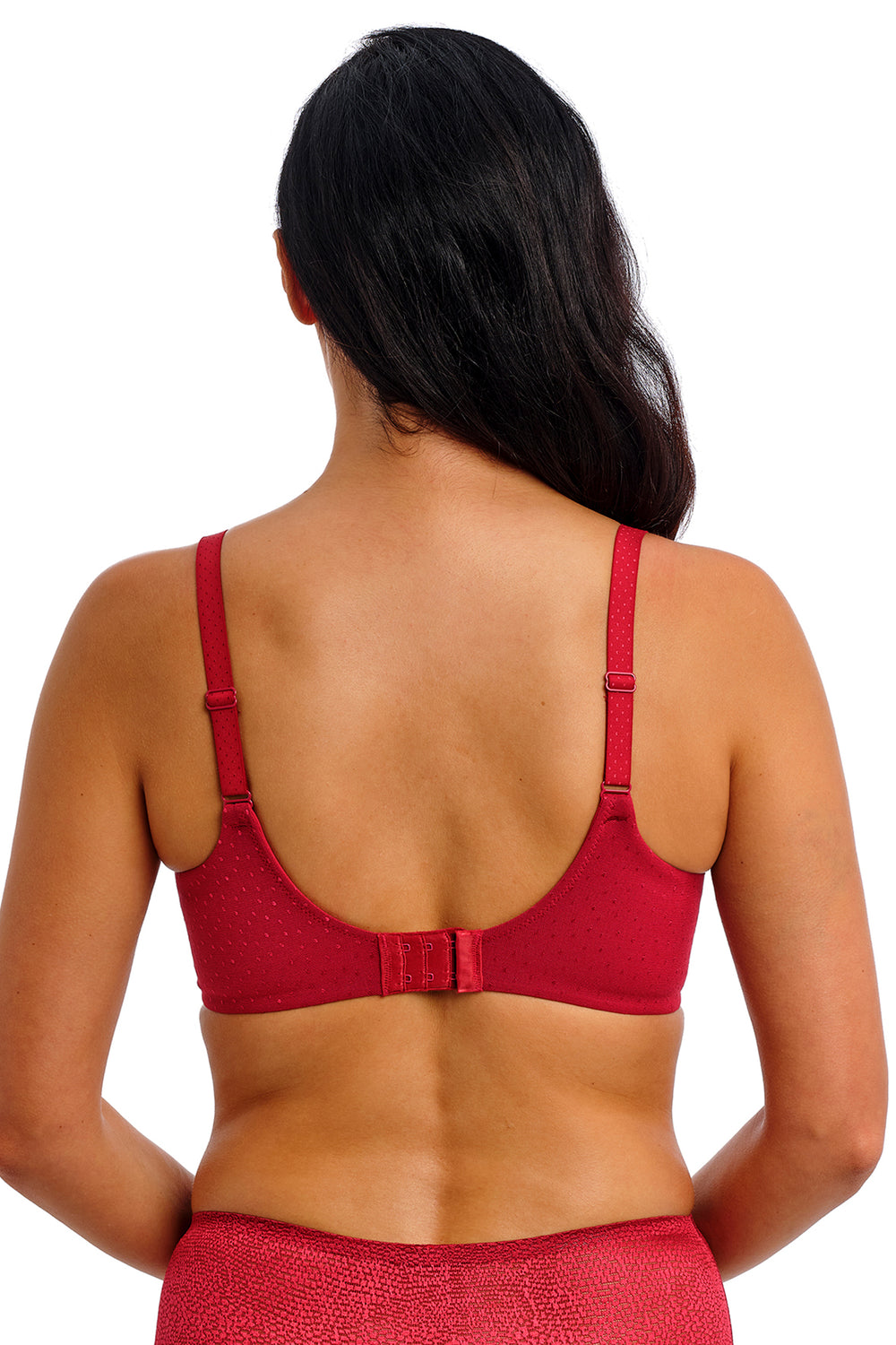 Red sports bra worn by a person on a white background